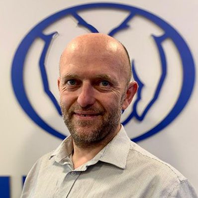 Headshot of Ben Greene. 