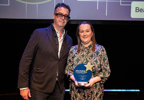 Allstate Northern Ireland employees accepts an award. 