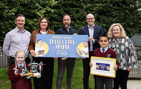 Allstate Ni employees presents the launch of North West Digital Hub. Childeren showing their innovation from the competition. 