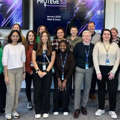 Allstate NI employees pose together at Protege 2.0 event. 